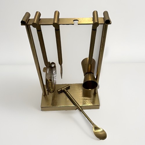 Gold tone metal cocktail tool - cocktail,